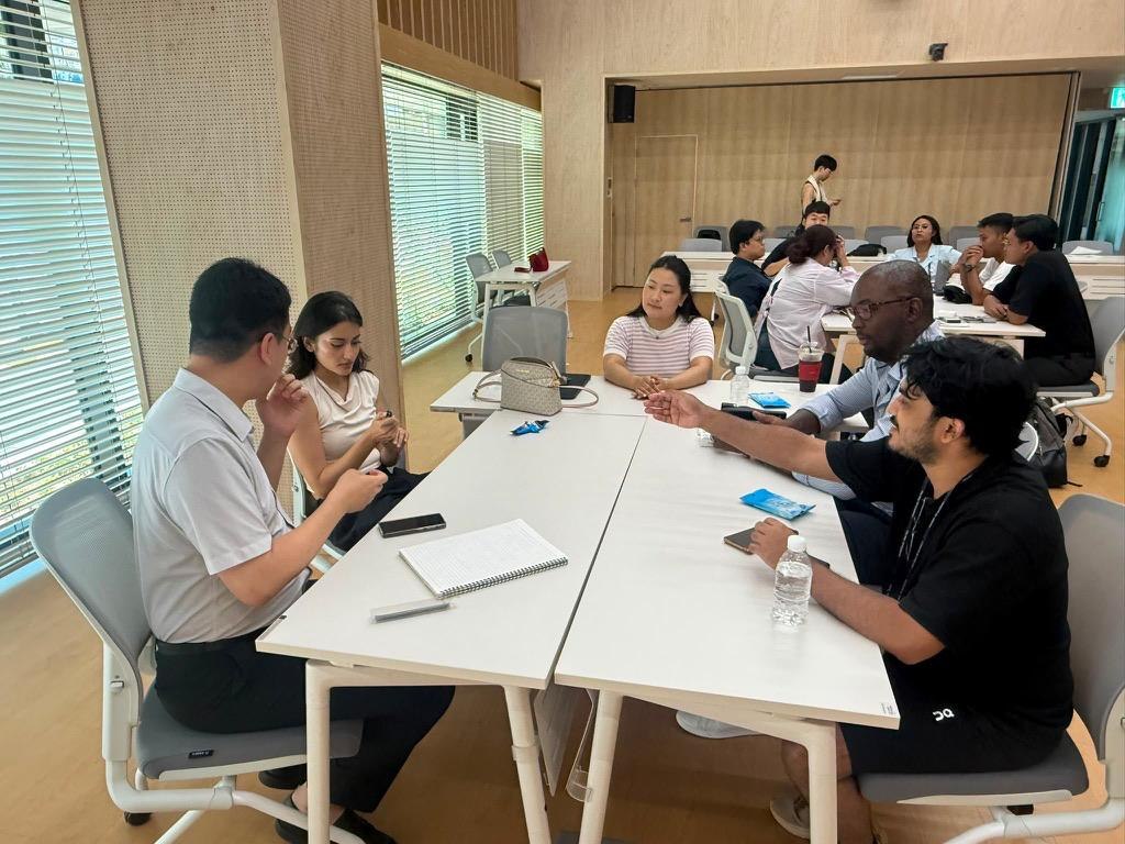 Execution Excellence - team reviewing project work together