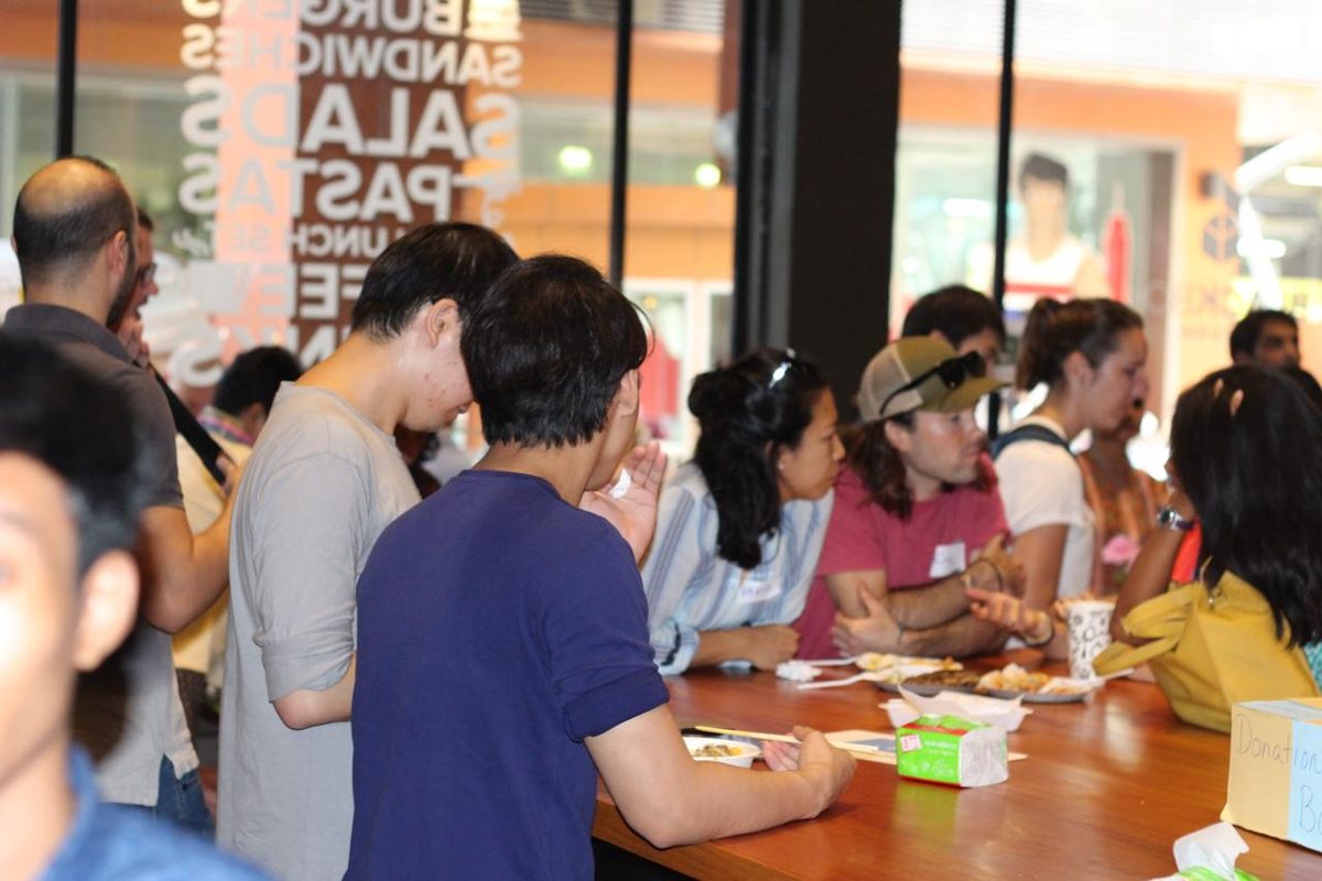 Dishes from every represented country were shared at a single table.